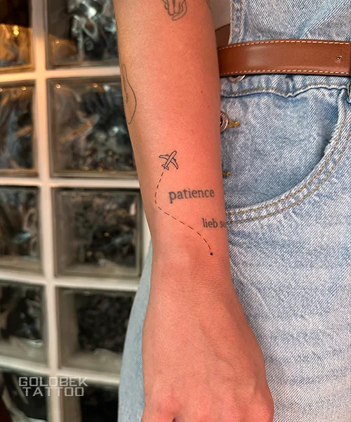 Matching tiny script tattoos made in Funchal